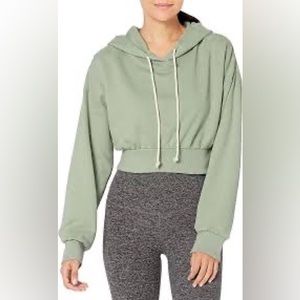 Cropped Nia “Bowery” hoodie.